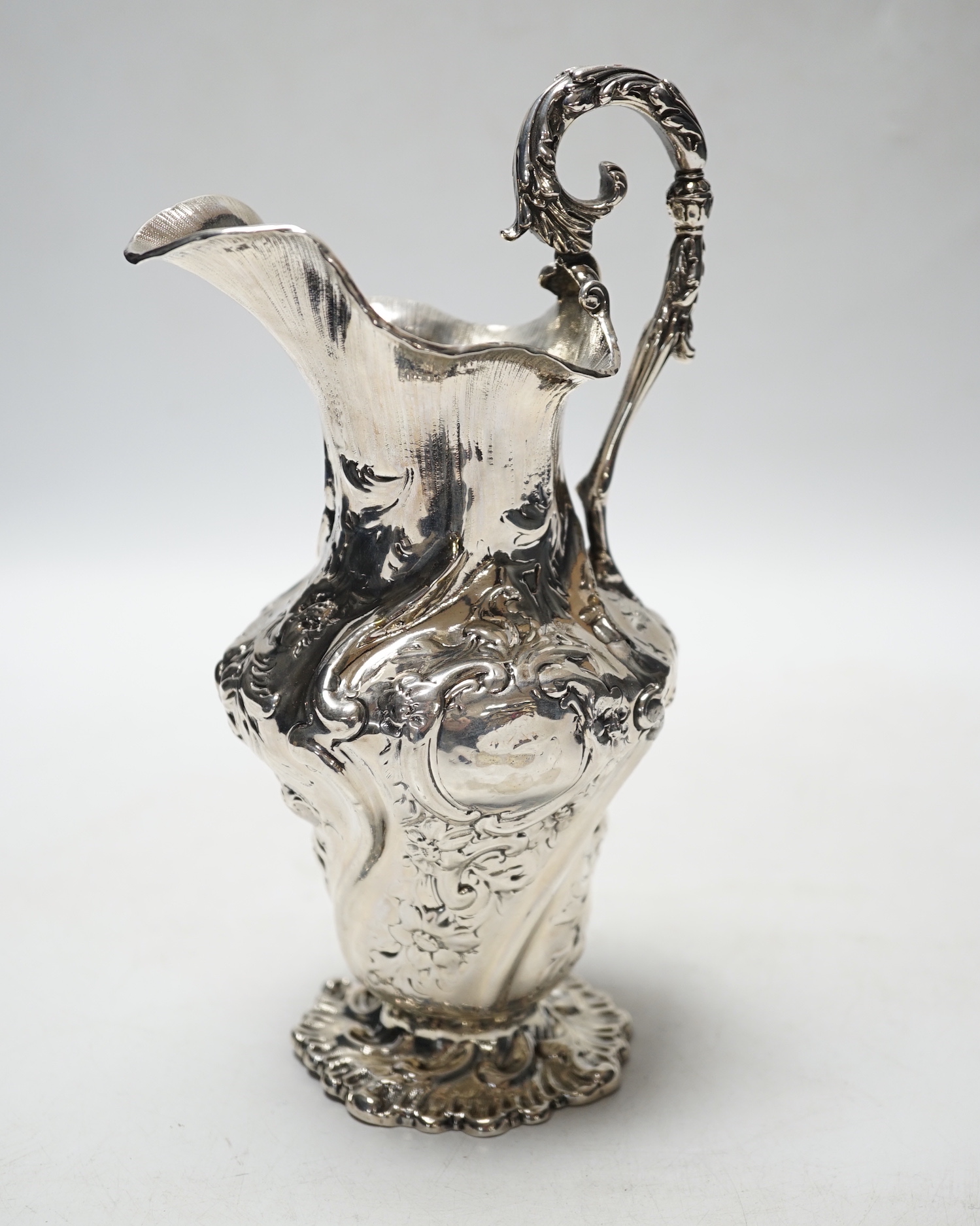 An ornate early Victorian silver cream jug, Charles Fox, London, 1838, 20.7cm, 9.8oz.